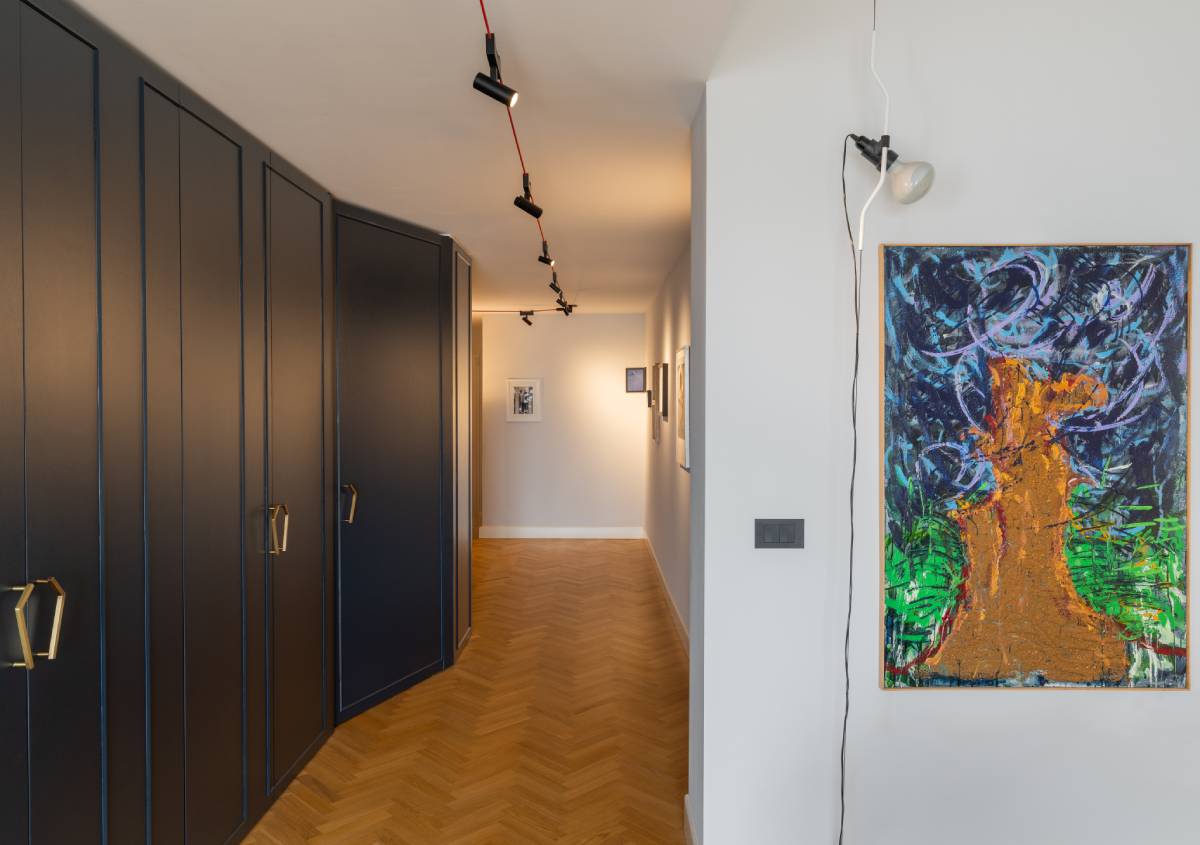Zona living e cucina su misura tra arte e design d’autore Zona living e cucina su misura tra arte e design d’autore